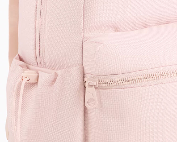 HER SMALL BACKPACK