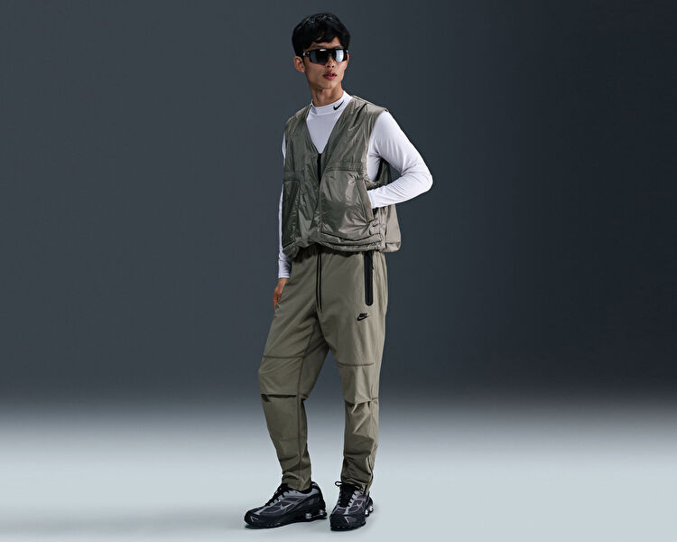 M NK TECH WVN OH PANT