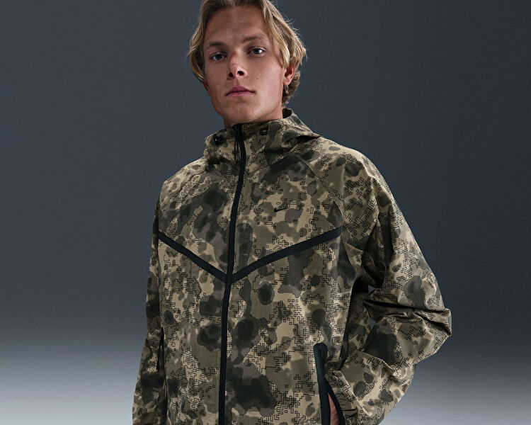 M NK TECH WVN JKT GX AOP