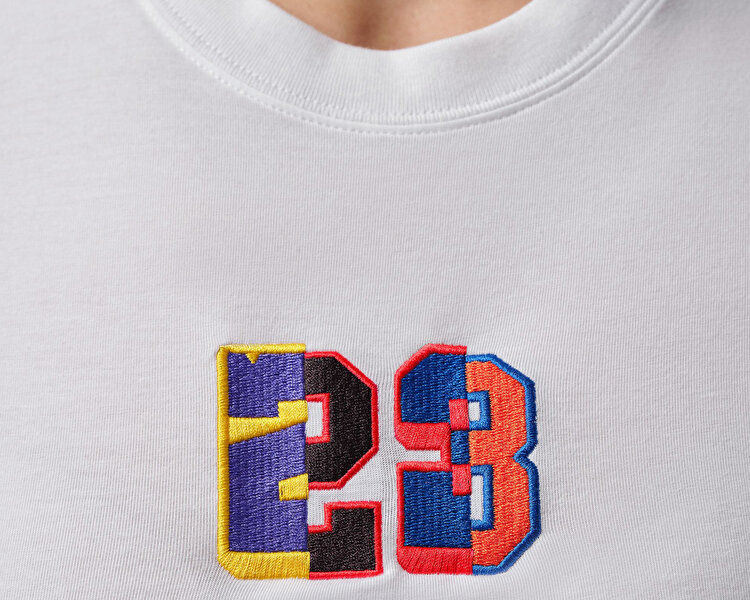 W JORDAN FLT SS TMID GFX TEE 23